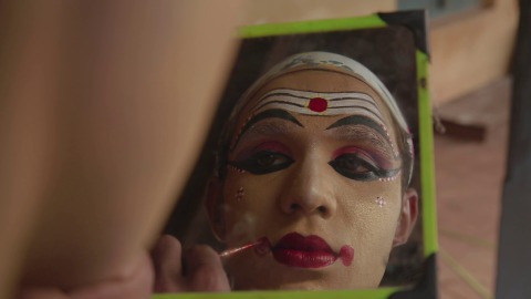 Artist wearing make-up for Ghoshayathra