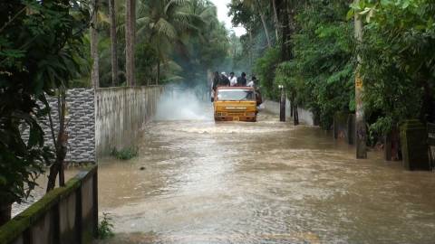 Truck passing through the flooded lanes in Kerala