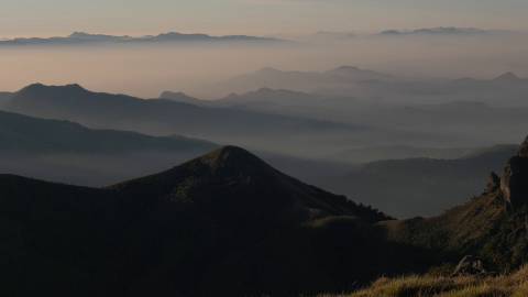 Wide range of blue hills covered in morning mist