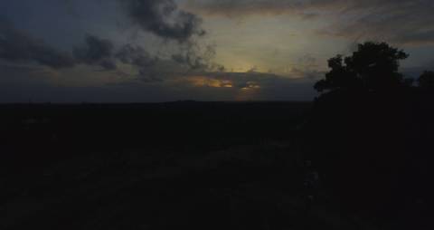 Dark evening sky with a faint golden glow