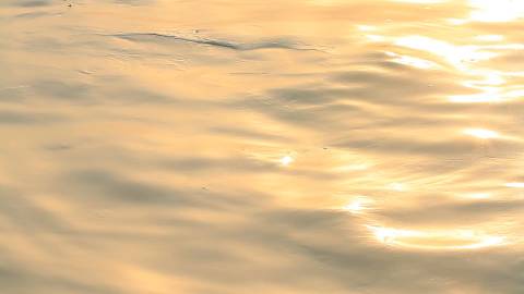 Golden sun reflecting on River Ganga, Uttarakhand