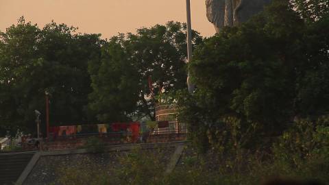 Lord Shiva statue and a Sadhu in Haridwar, Uttarakhand