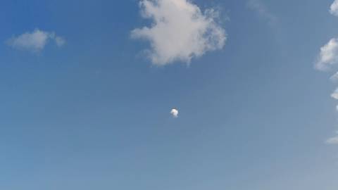 Clouds moving in the blue sky