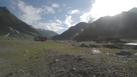 Truck passing though mountain road in Leh