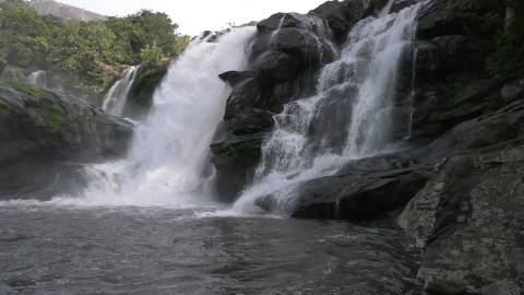 Waterfall gushes down rocks, Idukki, Kerala