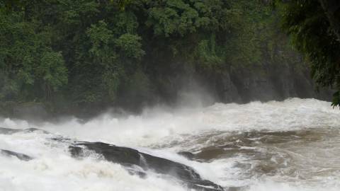 Water gushing down the rocks at Athirappilly, Kerala